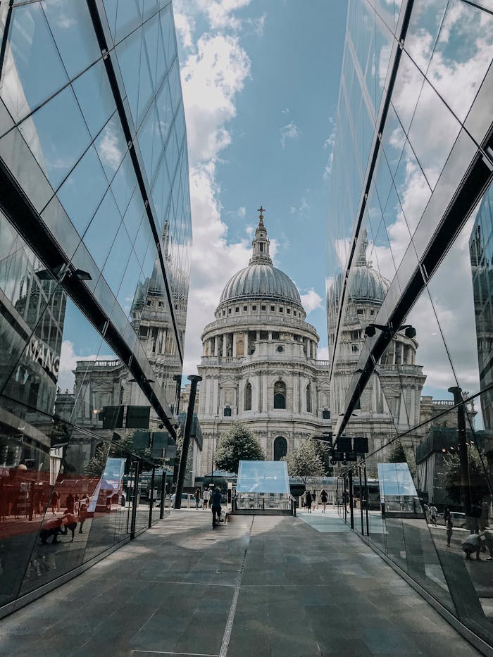 St. Paul's Cathedral in London seen through modern glass architecture.